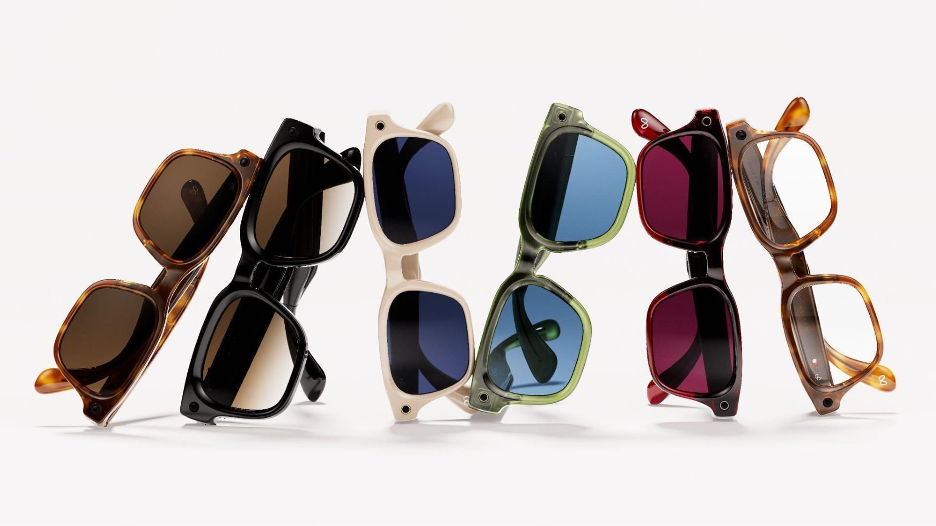 Seis gafas con IA de la colección Meta Glasses en fila sobre fondo blanco, en carey, negro, crema, verde, granate y ámbar